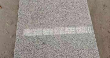 青岛芝麻白光面毛板